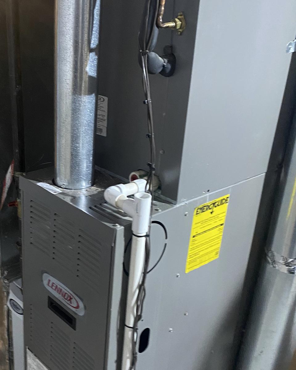 Newly installed gas furnace with new venting in a basement